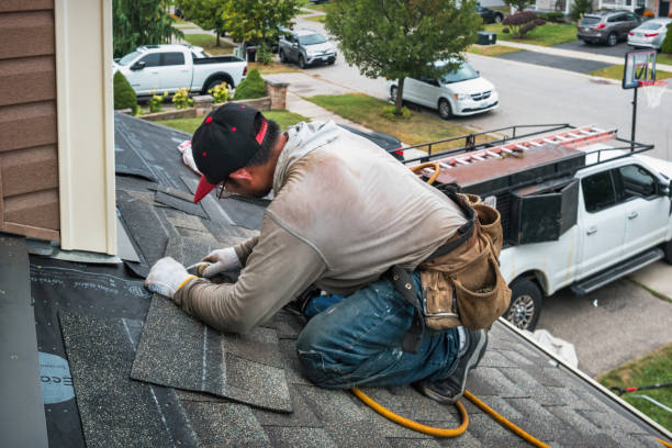 Professional Flat Roof Repair technician working in Camden, MO
